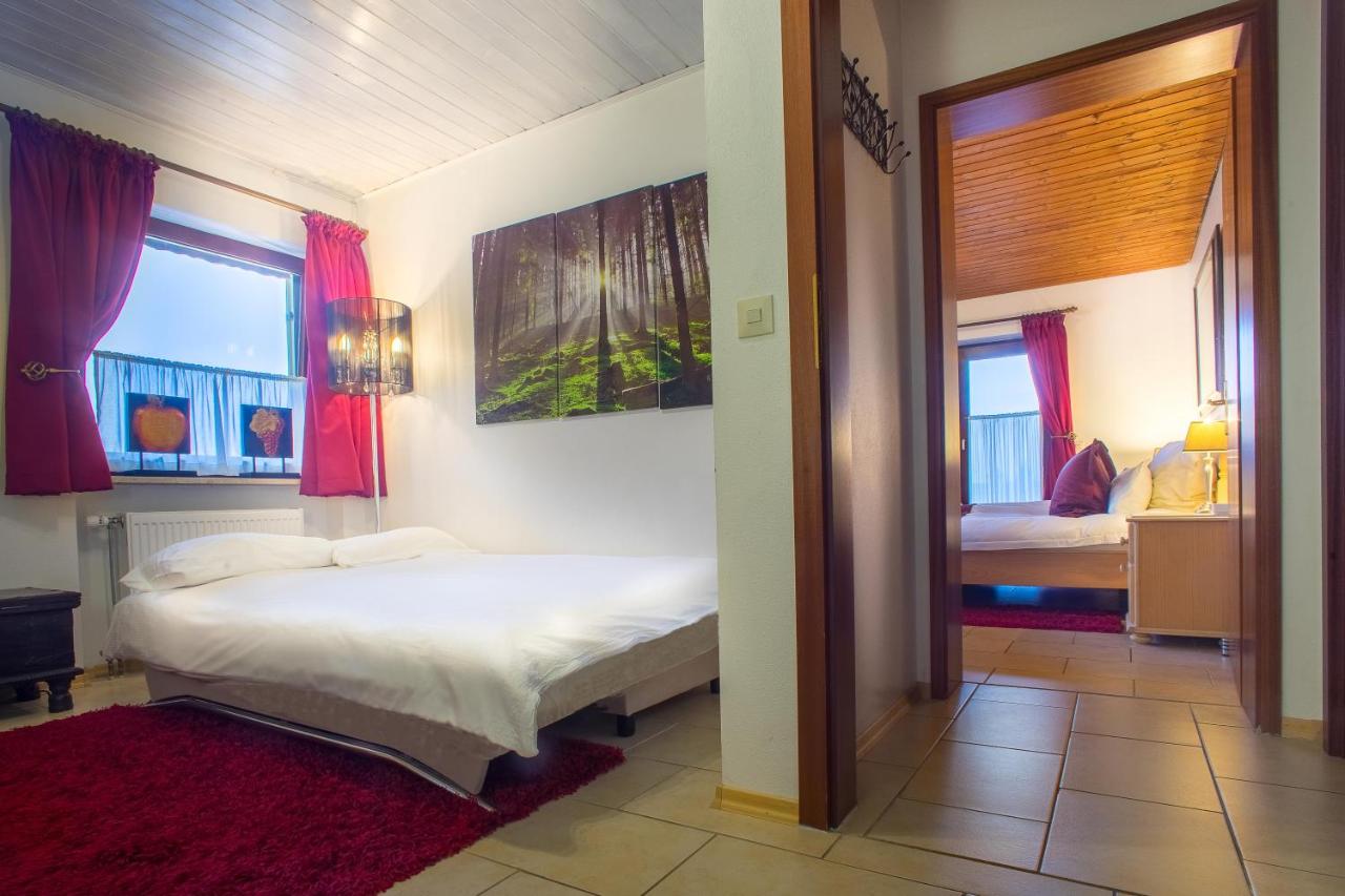 Chambre Familiale avec Balcon (2 Adultes + 2 Enfants)