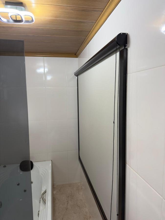 Chalé Vale da Paz 500m da Praca - B&B Palmeiras