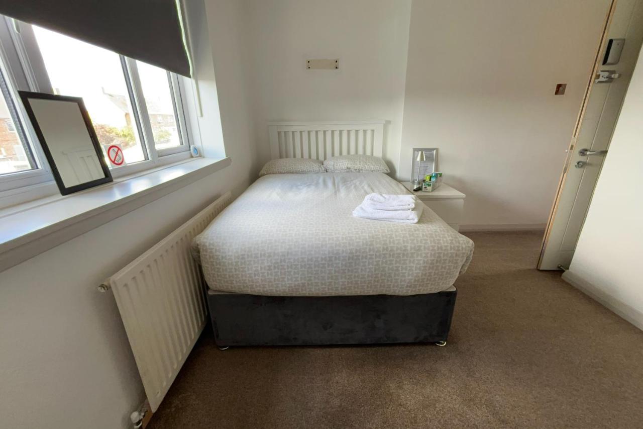 Queen Room with Shared Bathroom