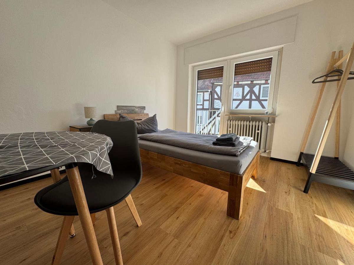 Eenpersoonskamer met Gedeelde Badkamer en Toilet