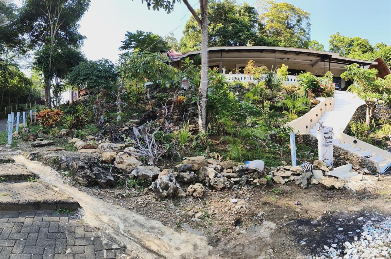 Pondok Indah Teluk Asmara - Chambres d’hôtes Rowoteratai