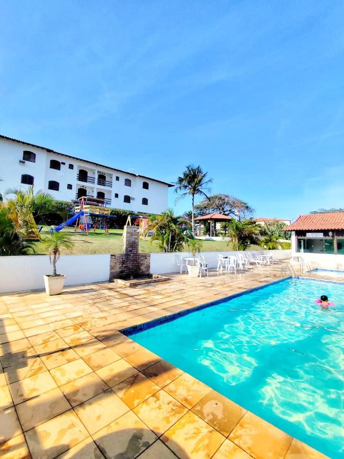 TOP 1 QUARTO com ESTACIONAMENTO em Condomínio com VISTA INCRIVEL - PORTARIA 24h, PISCINA, Sauna e Parquinho Infantil - Apartamento com Ar condicionado, Smart TV, Wi-Fi, Cozinha Completa, NETFLIX, Entre o MAR e a LAGOA, CUSTO BENEFICIO - Bed and Breakfast São Pedro da Aldeia