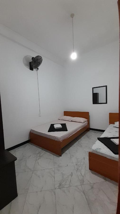 Chambre Triple avec Salle de Bains Commune