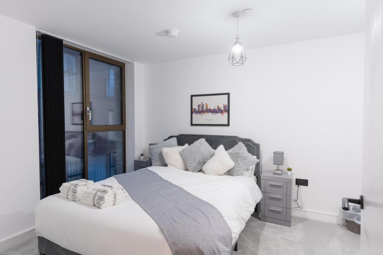 2 Bed Apartment, in the heart of Manchester City Centre! 7 mins walk from Piccadilly Station! - Chambres d’hôtes Manchester