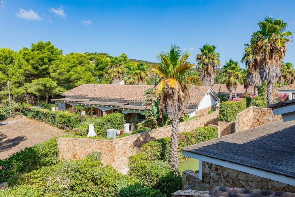 Appartamento in residence con piscina - B&B Porto Pino