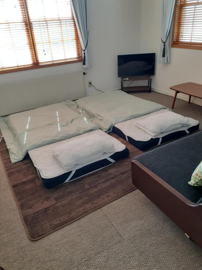 ゲストハウス苫小牧 203号室 - Bed and Breakfast Tomakomai