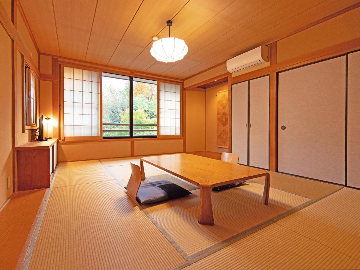 Chambre Triple avec Salle de Bains Commune