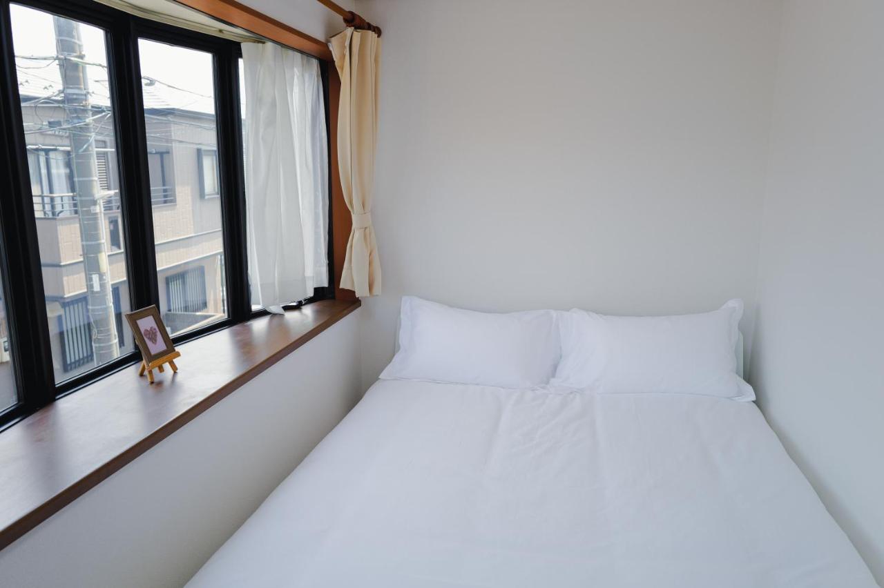 Tweepersoonskamer met Gedeelde Badkamer