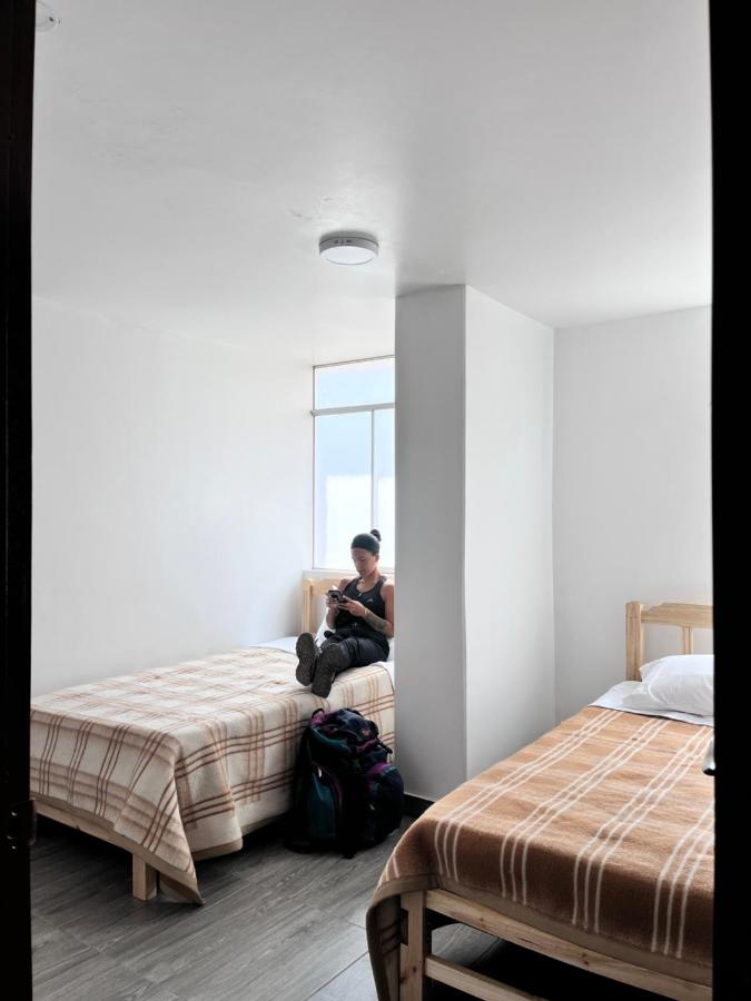 Single Bed in Dormitory Room