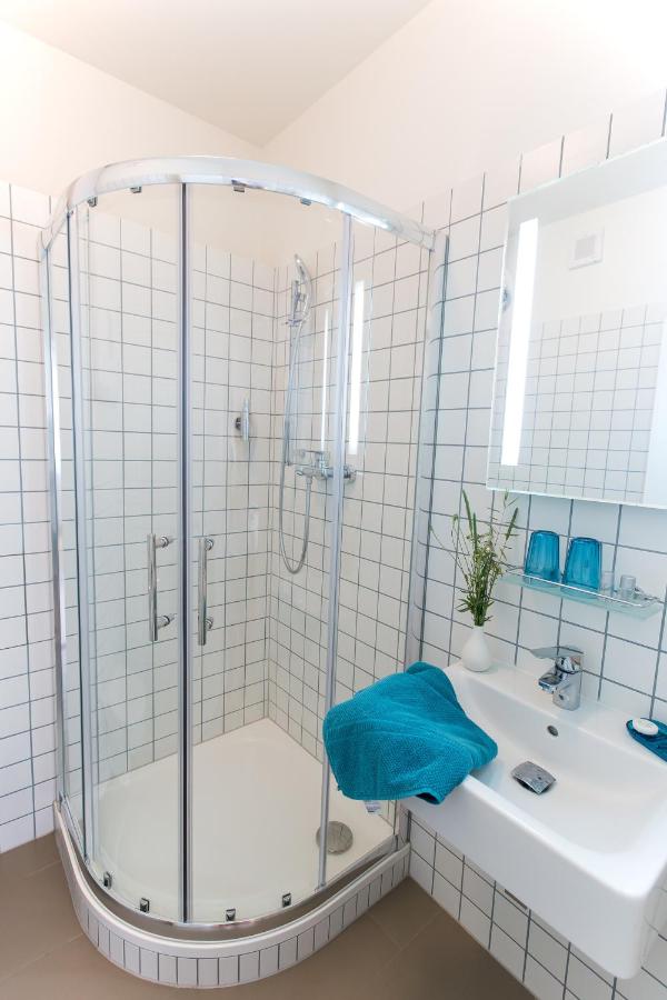 Habitación individual básica con baño compartido