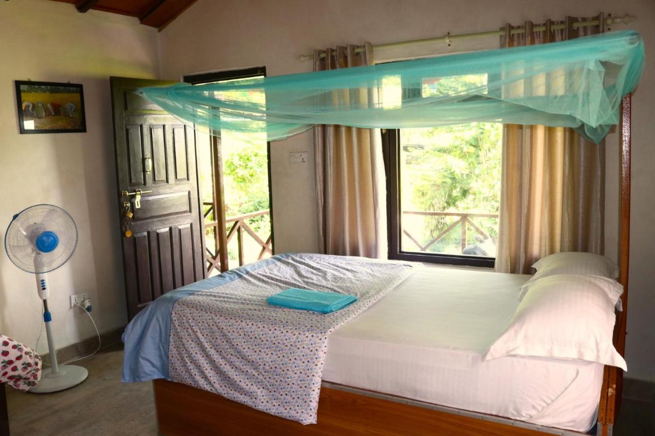 Deluxe Tweepersoonskamer met 1 of 2 Bedden en Uitzicht op de Tuin