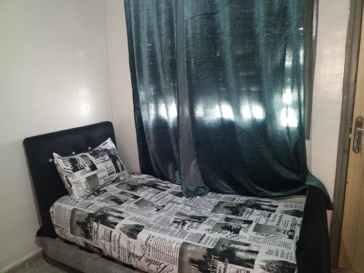 Single Bed in Dormitory Room