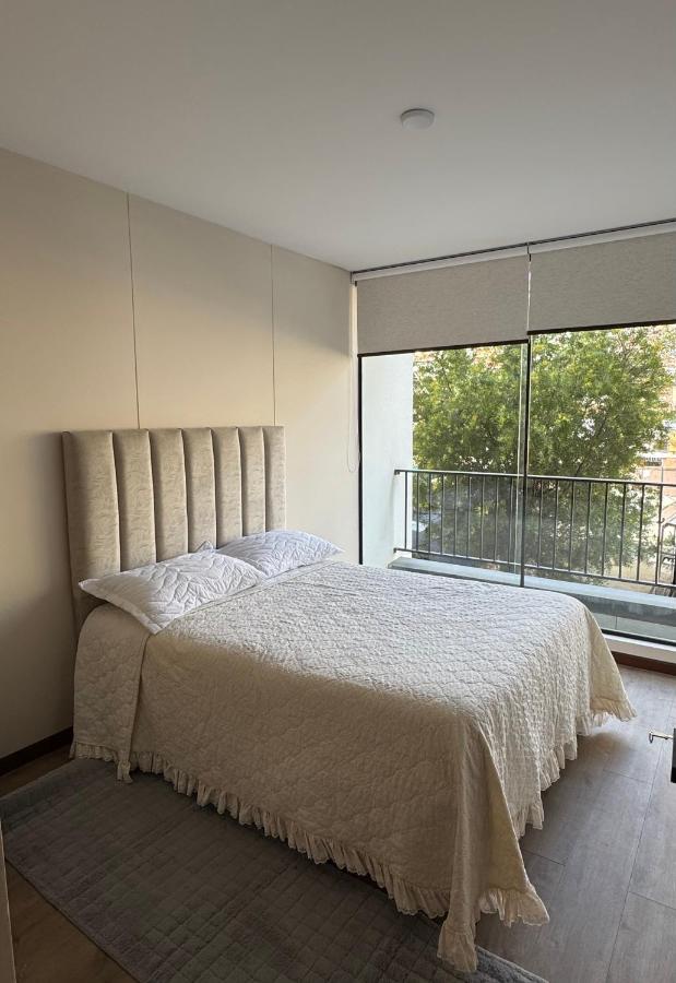 Elegante y acogedor departamento a pasos de San Miguel - B&B La Paz