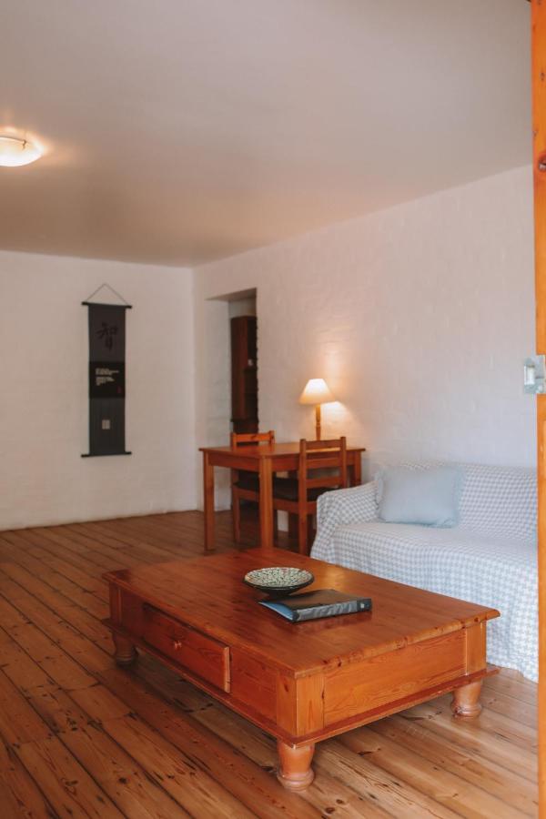 Beachfront Apartment with Garden View