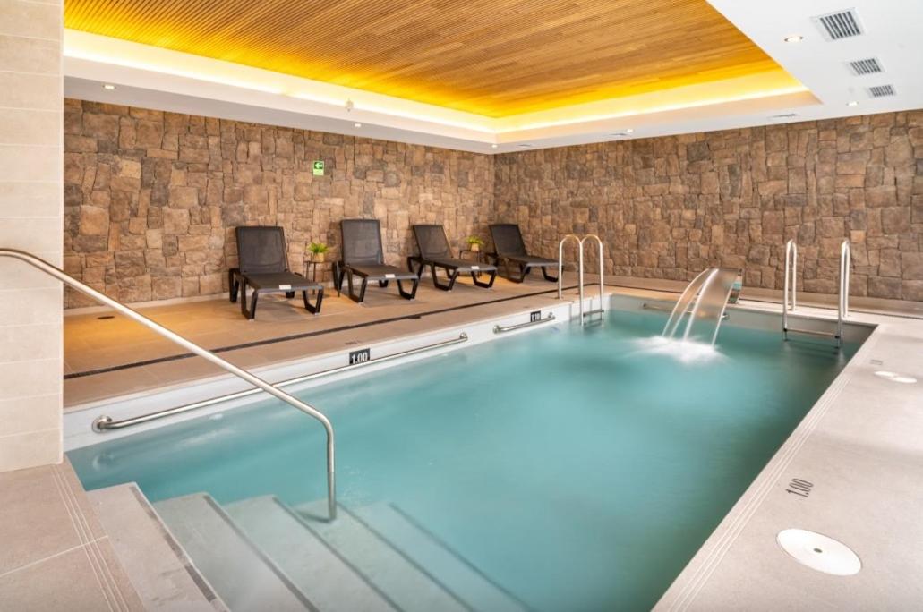 COD26 - Piscina temperada, jacuzzi y gran ubicación! - Chambres d’hôtes Puerto Varas