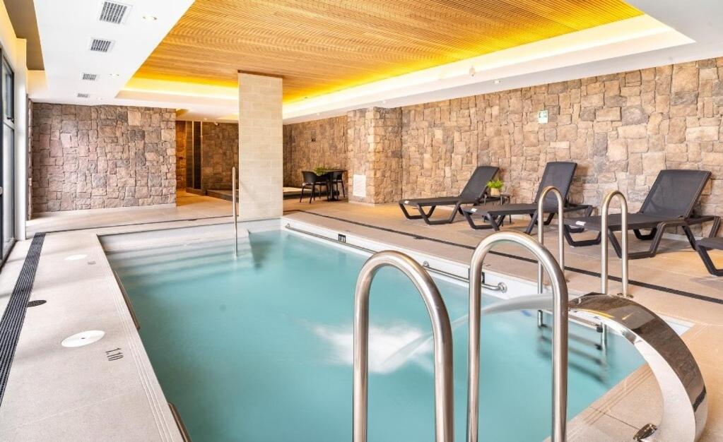 COD26 - Piscina temperada, jacuzzi y gran ubicación! - Chambres d'hôtes Puerto Varas