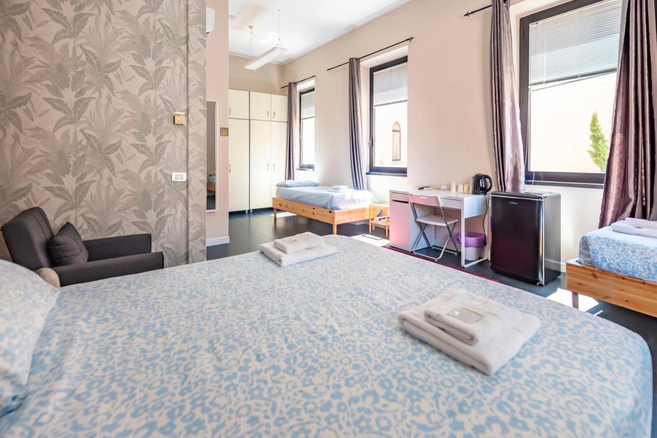 Quadruple Room with Private Bathroom