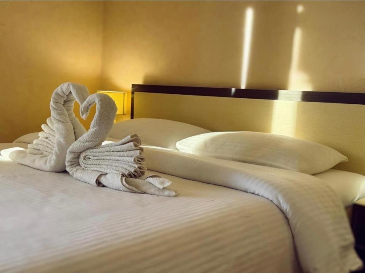 Camera Tripla con Balcone