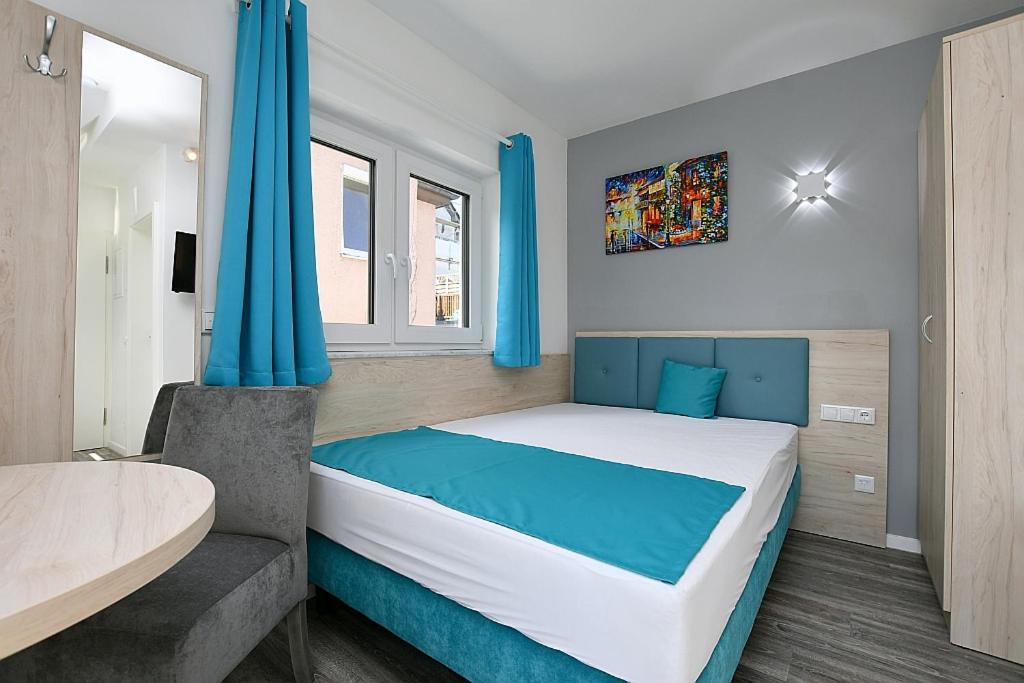 Doppelzimmer mit Balkon