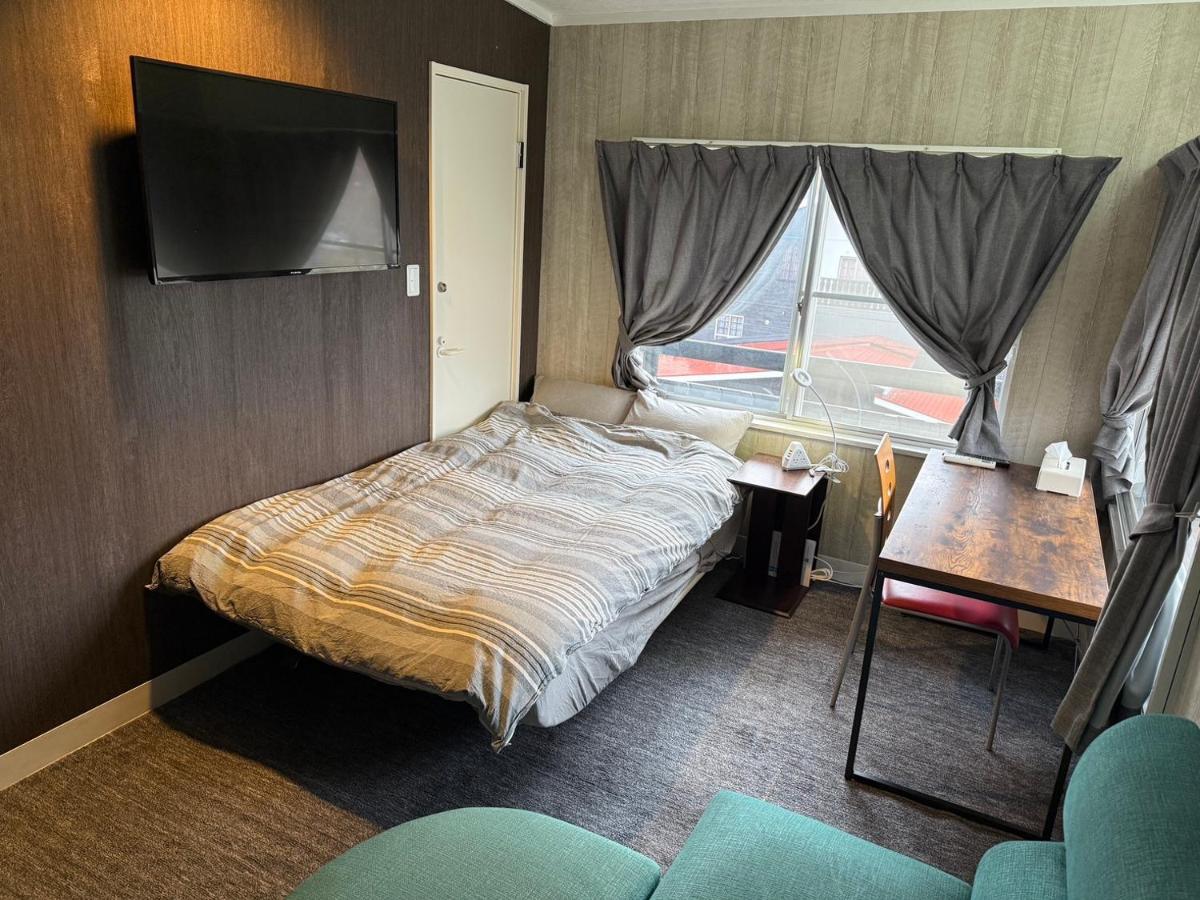 Single Room with Shared Shower and Toilet