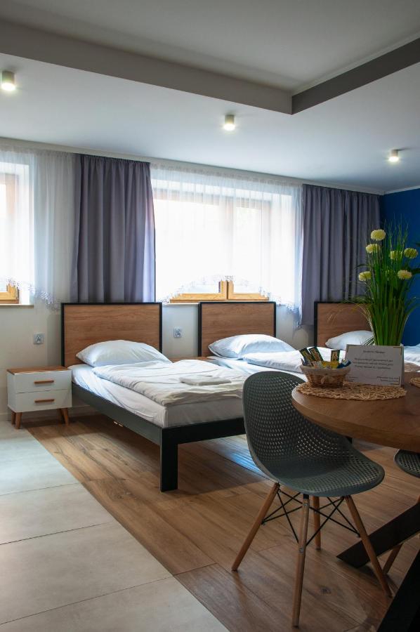 Tanie Noclegi Gliwice - Apartamenty Łowicka 28 - B&B Gliwice