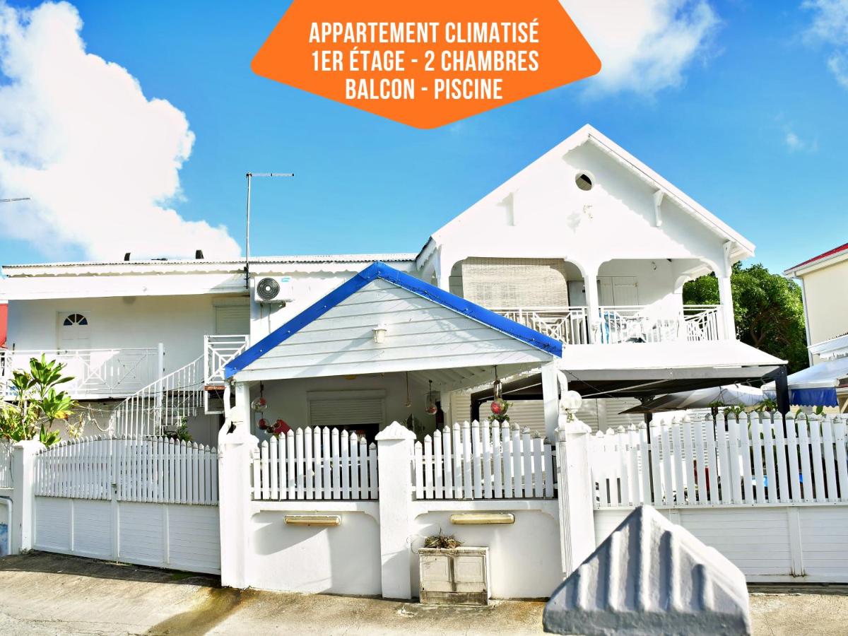 Le Sable Bleu - Évasion tropicale - Idéal Couples & Familles - PLAGE 5min - Piscine - Parking privé - Logement climatisé - Vue sur les palmiers - Restau snack familial sur place - B&B Sainte-Anne