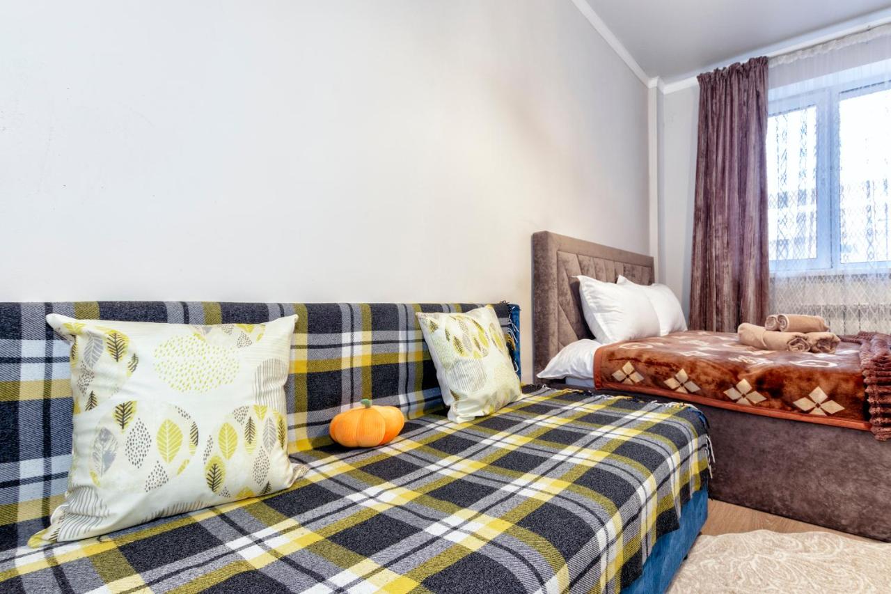 "Шоколадный трюфель" Уютная квартира на Туране рядом с медицинскими учреждениями - Chambres d'hôtes Astana
