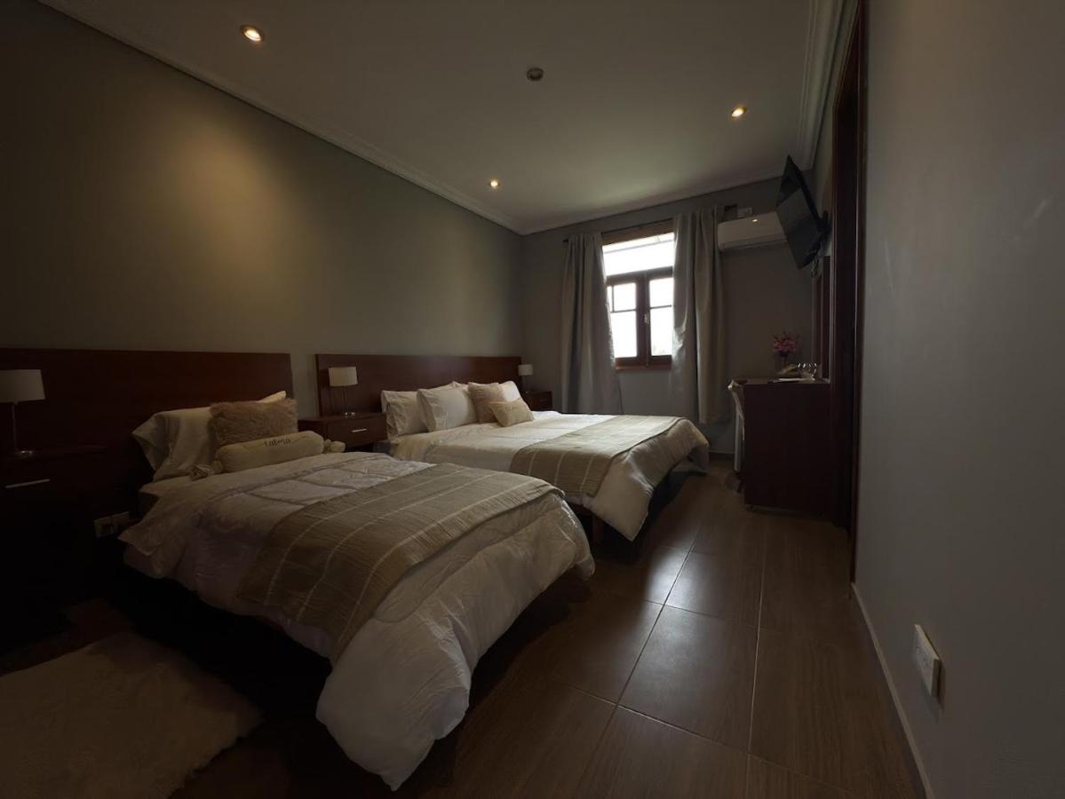 Habitación Triple con vistas al jardín