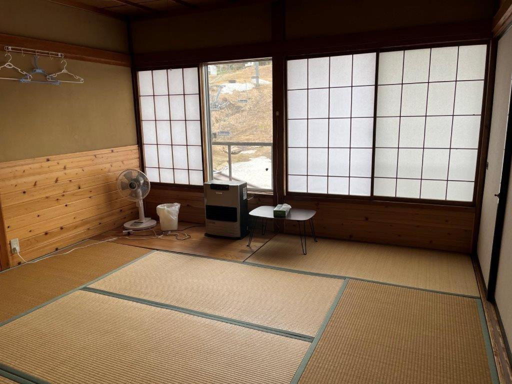 Economy Quadruple Room with Shared Bathroom