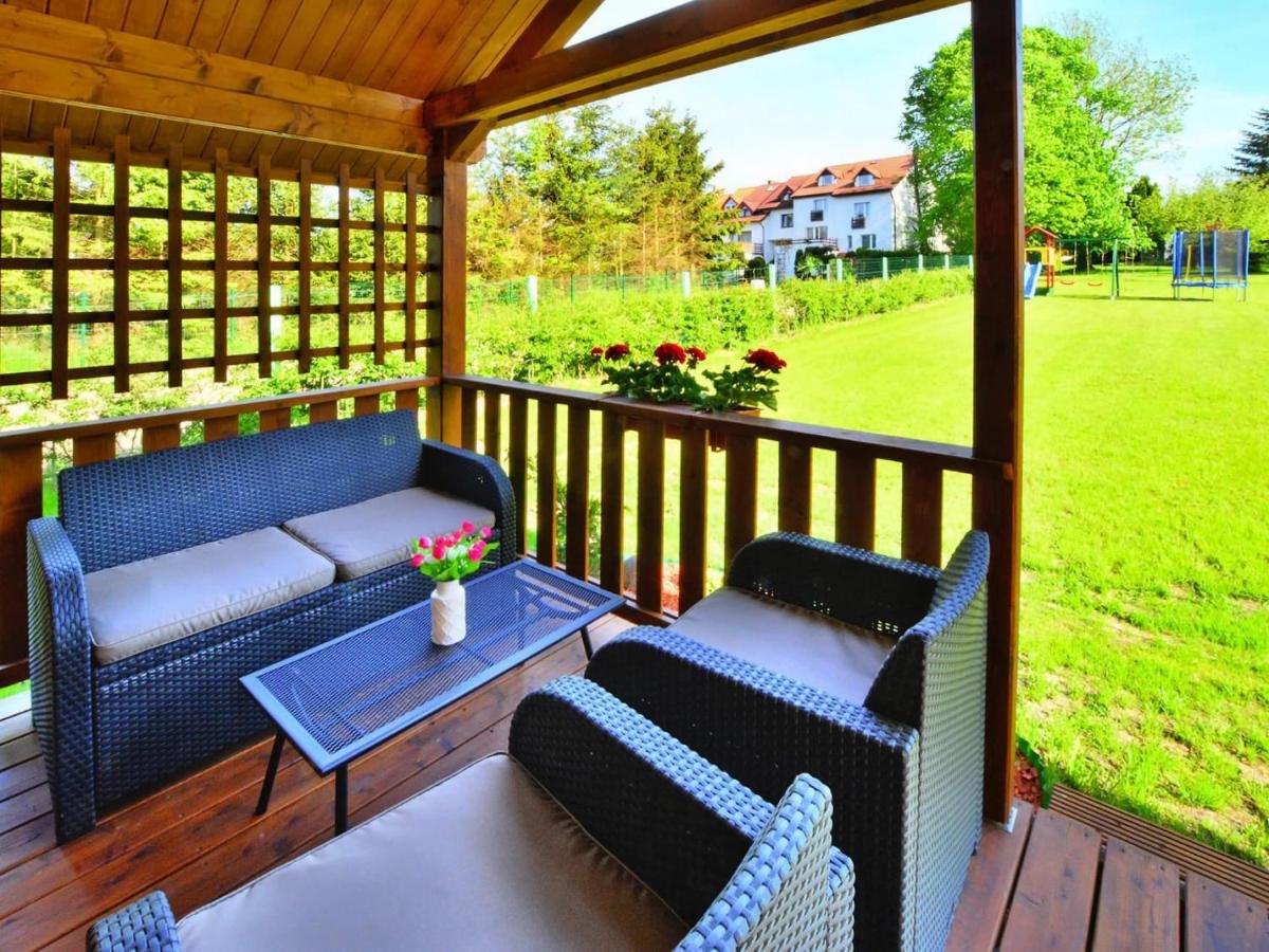 Holiday homes with terraces, large garden - Ferienwohnung Henkenhagen