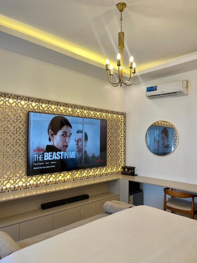 One-Bedroom Apartment with Balcony and City View