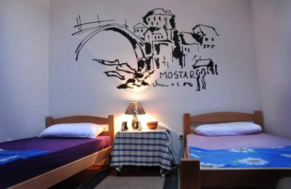 Camera Tripla Economy con Bagno in Comune