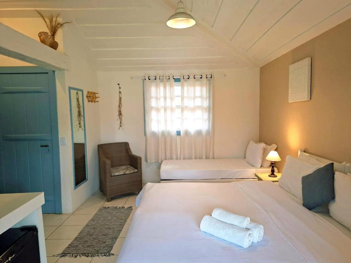 Habitación Triple con vistas al jardín