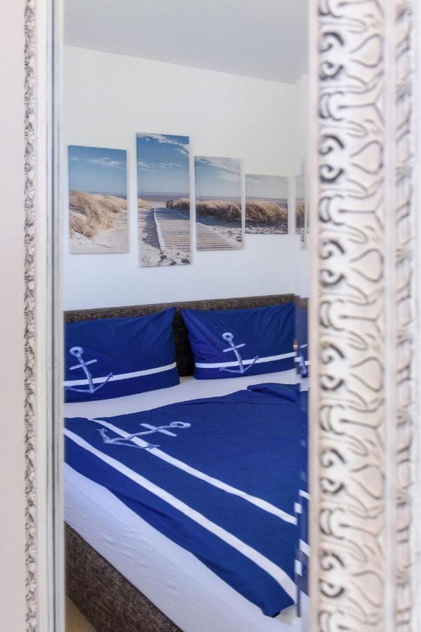 Haus Wind&Wellen, Wohnung Hafen - Bed and Breakfast Wittdün