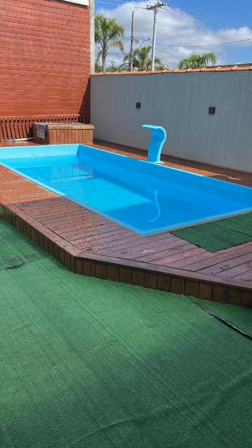 Casa com piscina - B&B Tramandaí