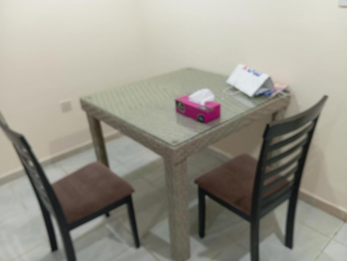 Happy living room stay - B&B Sharja