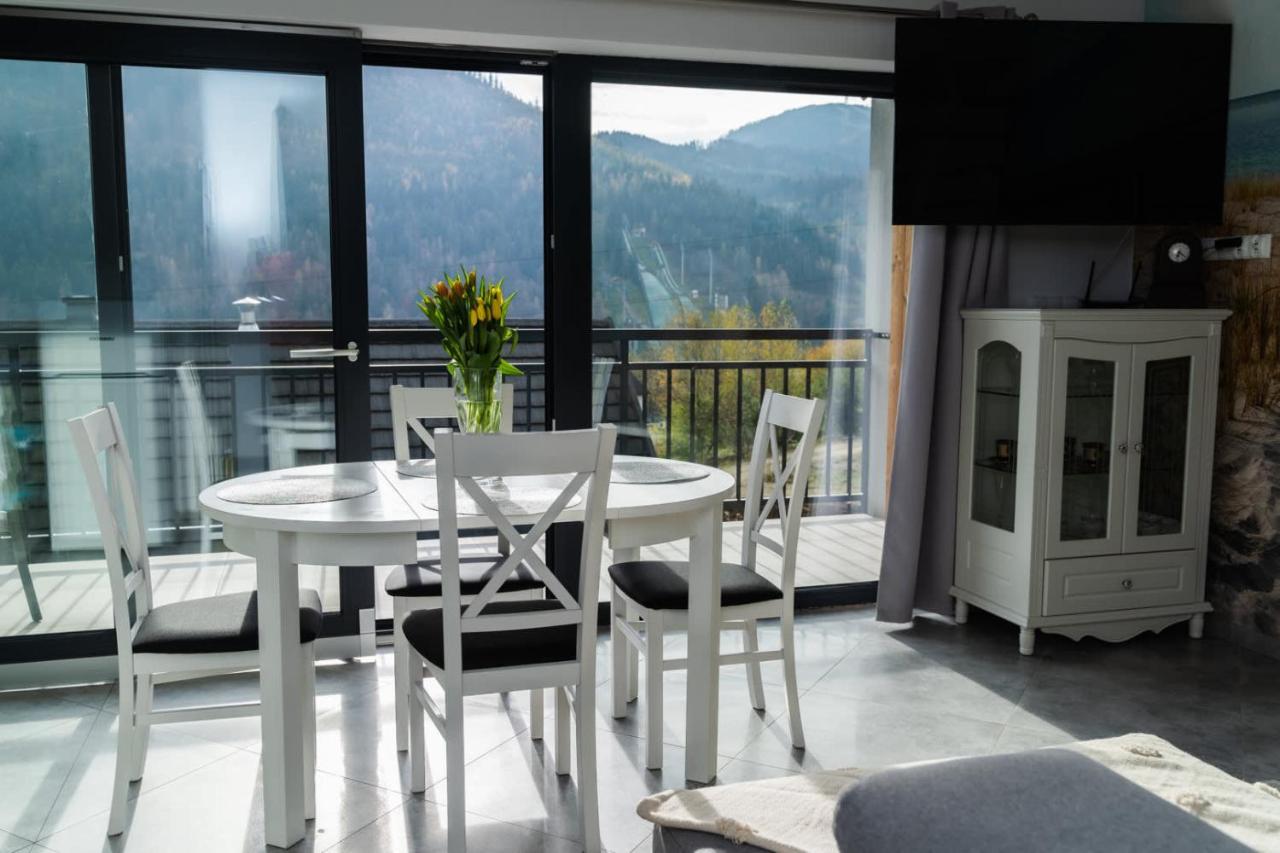 Sunny Apartment with Parking & Balcony with Mountain View by Noclegi Renters - B&B Szczyrk