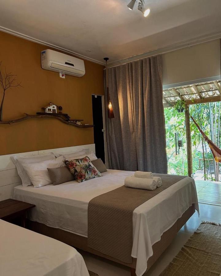 Aruana Suites com Cafe da manha,Piscina, Reserva Natural da Sapiranga 5km da Vila de Praia do Forte - B&B Castelo da Tôrre