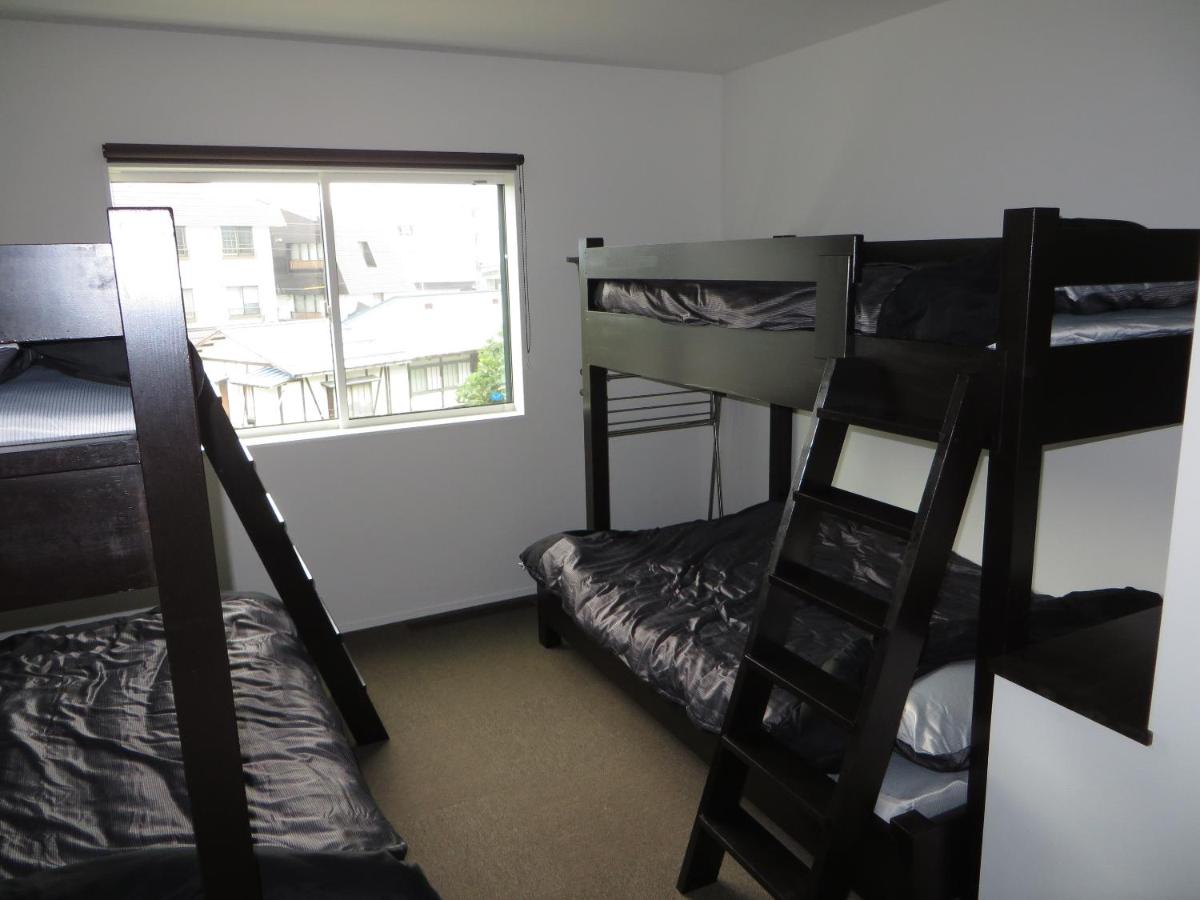 Room with Bunk Beds and Shared Bathroom 