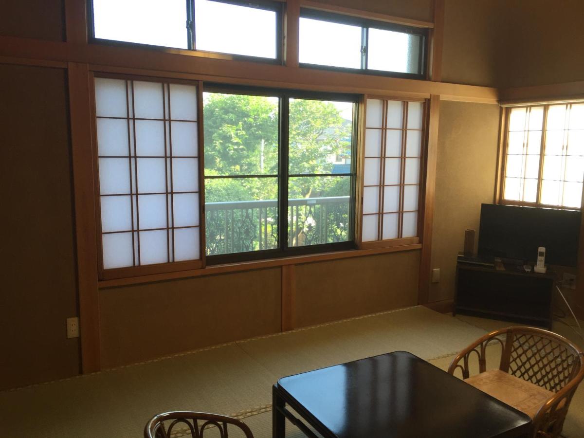 Zimmer im japanischen Stil mit Gartenblick 202