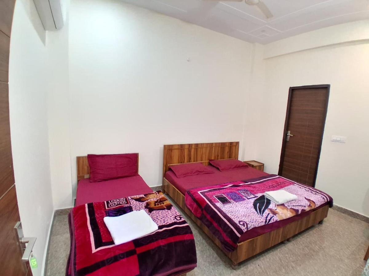 Chambre Triple avec Salle de Bains Privative