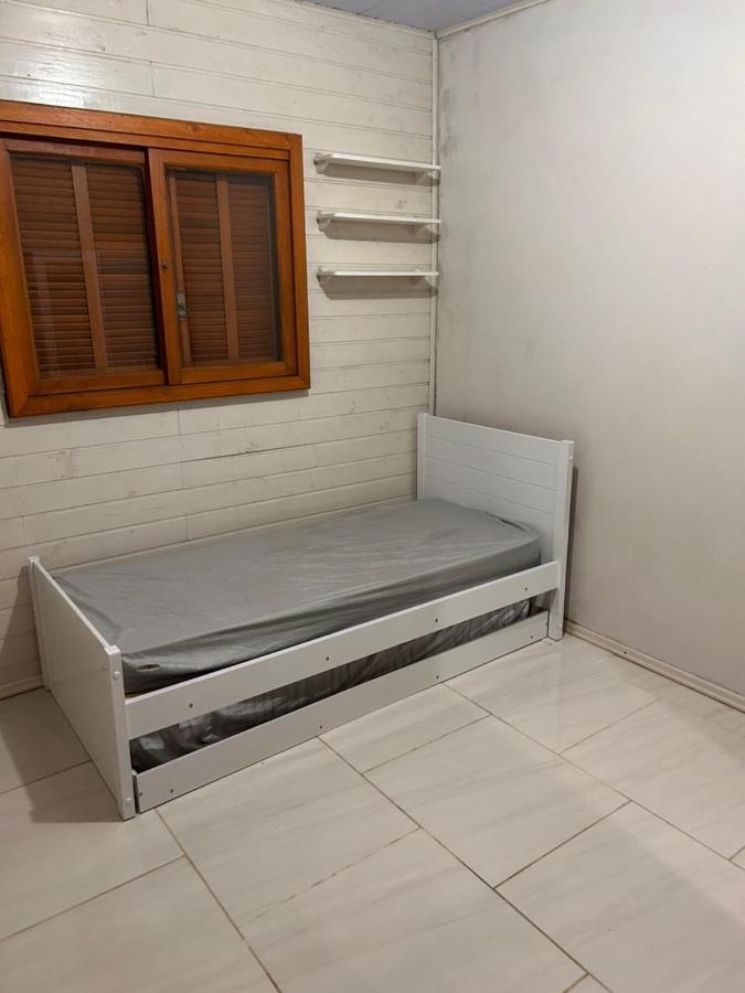 Casa com três quartos, piscina e área Gourmet - Ferienwohnung Torres