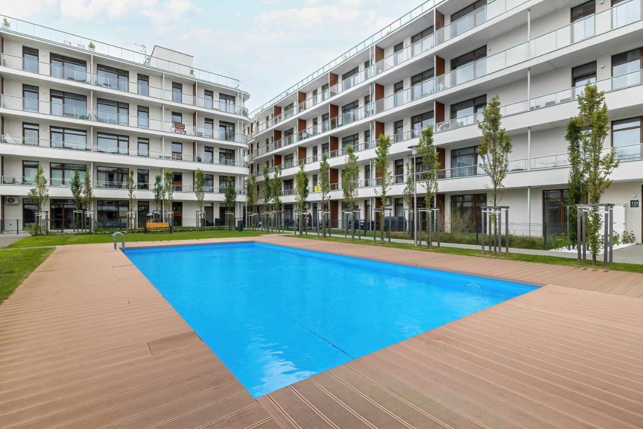 Blue and Beige Apartment in Sianożęty with Seasonal Pool, Parking and Balcony by Noclegi Renters - Chambres d'hôtes Sianożęty