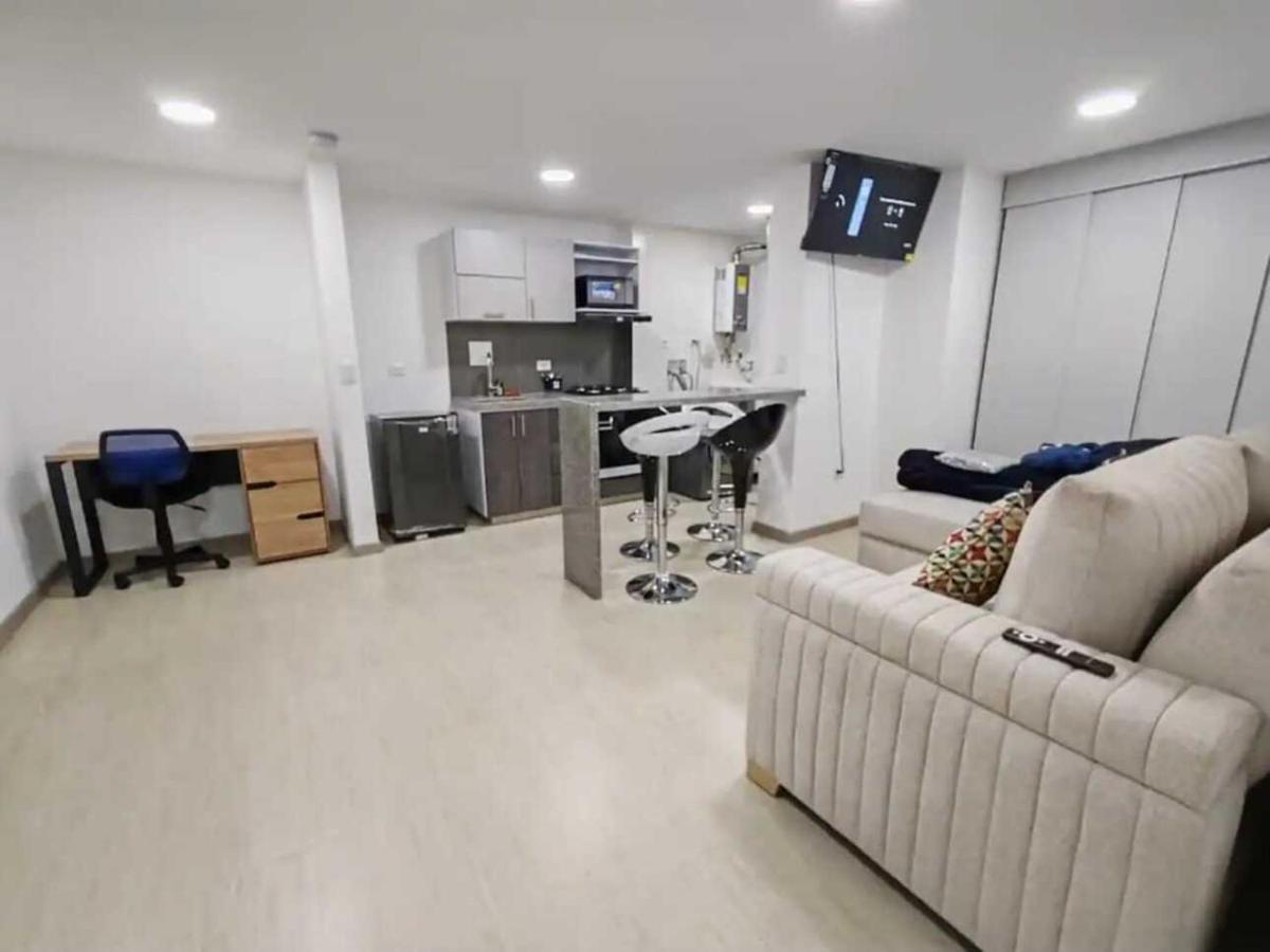 Apartamento moderno frente a la Universidad Santo Tomás WiFi y parqueadero - Chambres d'hôtes Tunja