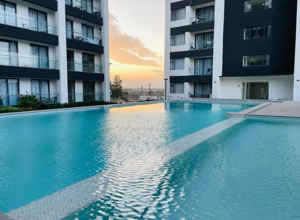 Cozy 1BR Luxury Suites near the Airport with pool, gym & city views - B&B Nairobi