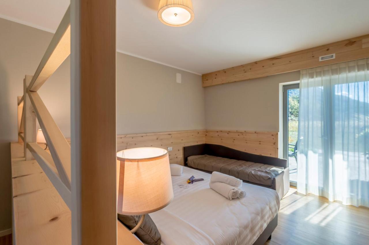 Dreibettzimmer mit Gartenblick