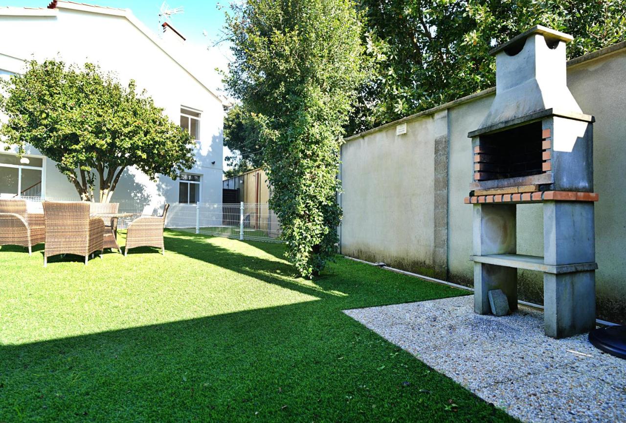 GALIHOST - Apartamentos con jardín en el centro de Sanxenxo - Chambres d'hôtes Sanxenxo