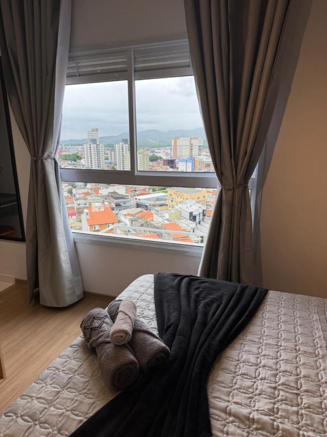 Studio 63 novo, luxuoso e completo com ar condicionado e cama Queen Size - Centro Mogi - Até 4 Pessoas - B&B Mogi das Cruzes