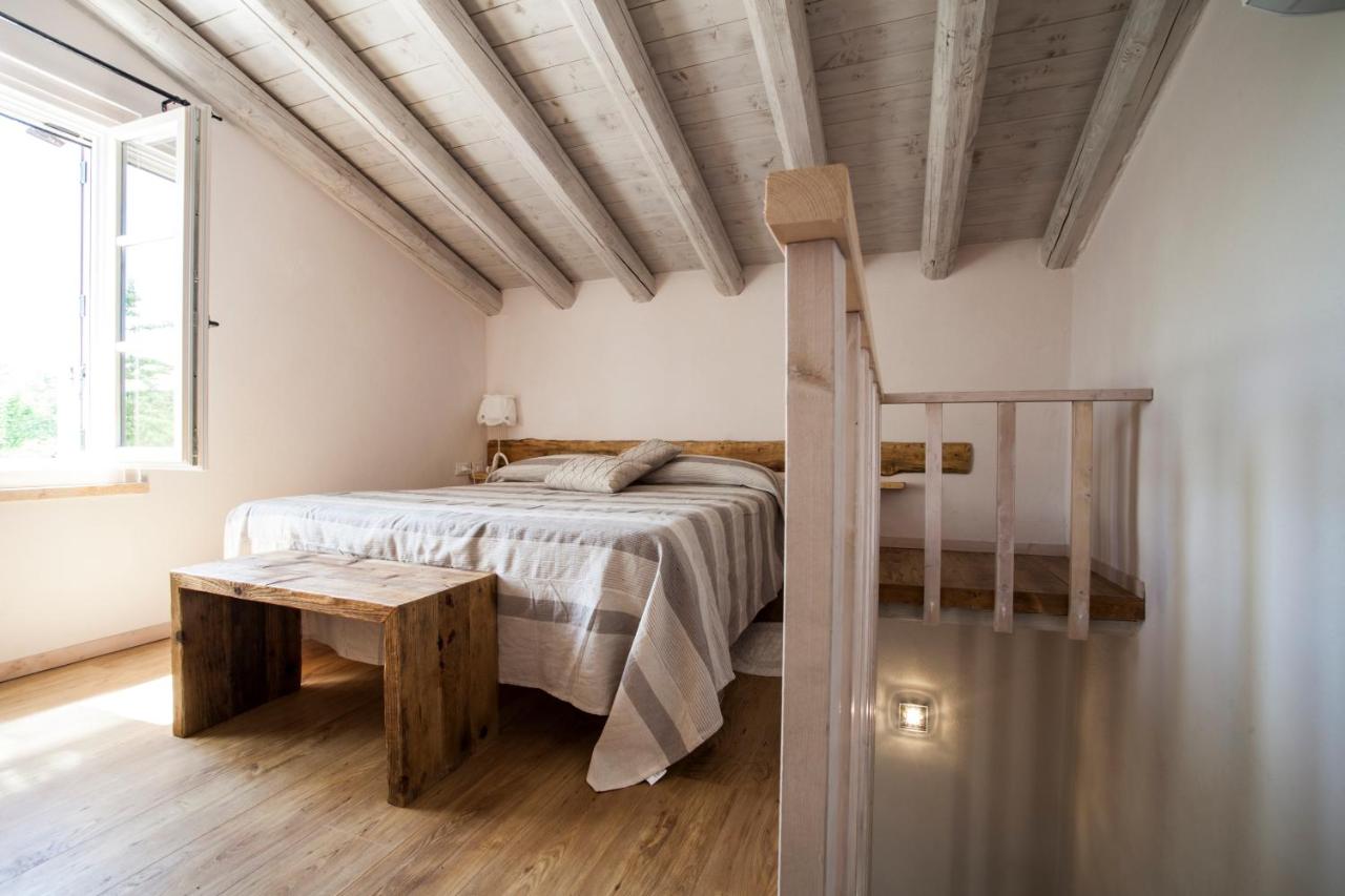 Dreibettzimmer mit Gartenblick