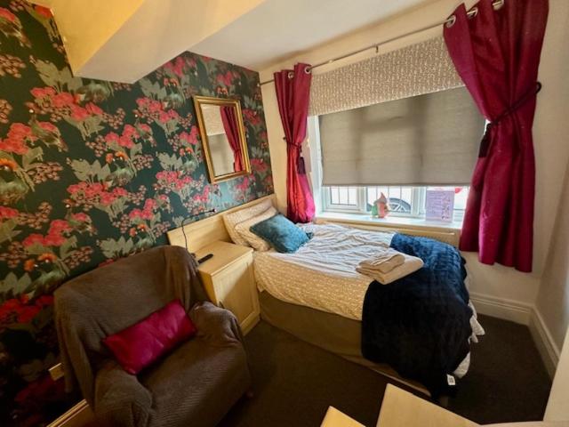 Camera Singola con Bagno Privato